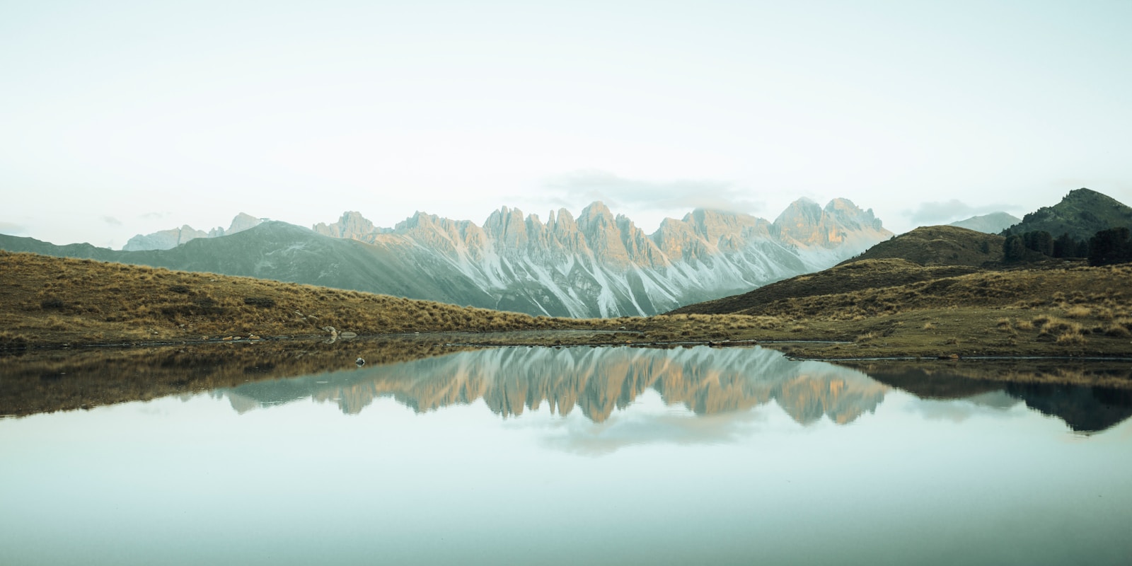 Mountain range reflected in a calm lake